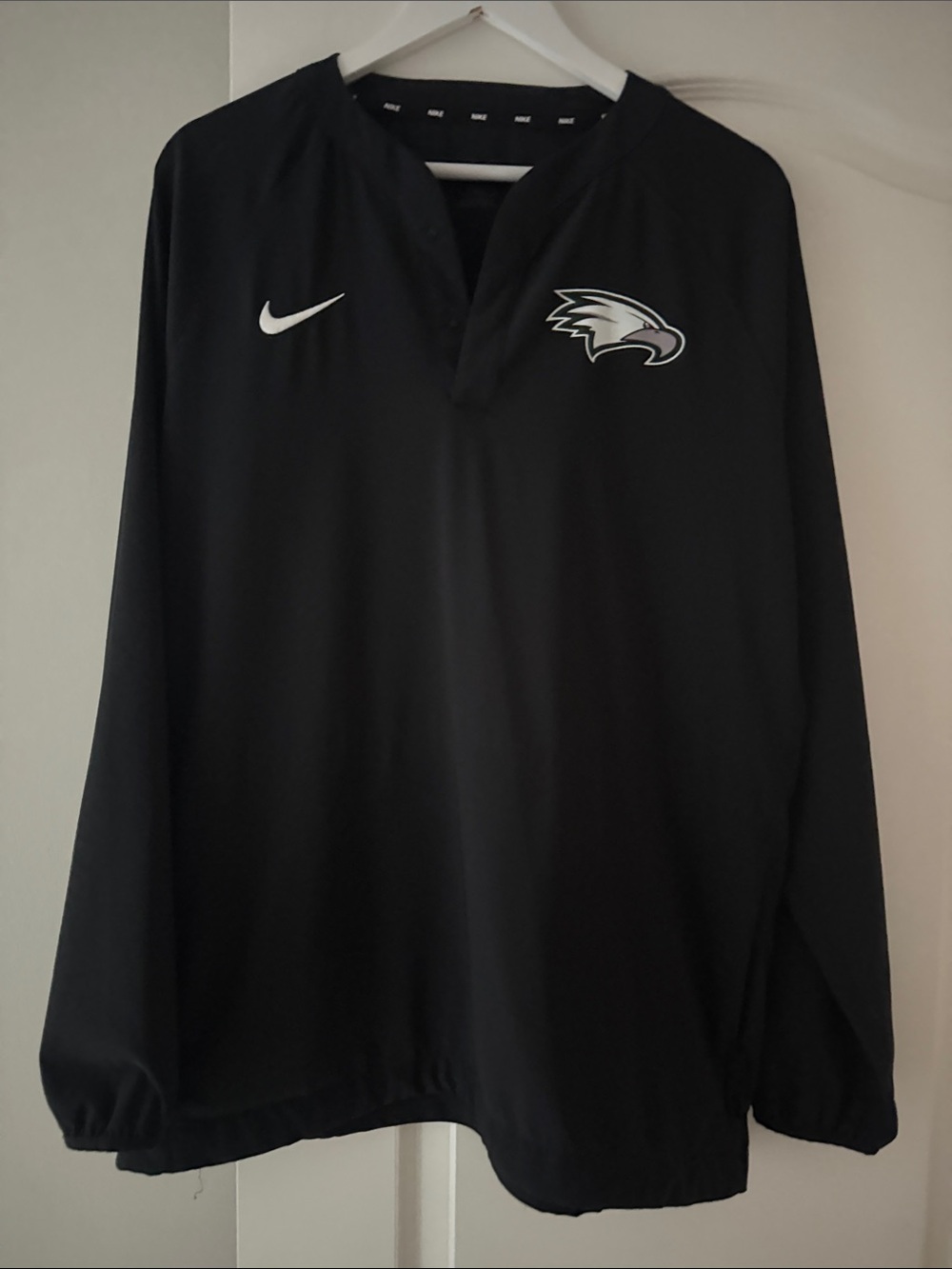 Nike Black Long-Sleeve Pullover with White Swoosh & Eagles Team Emblem